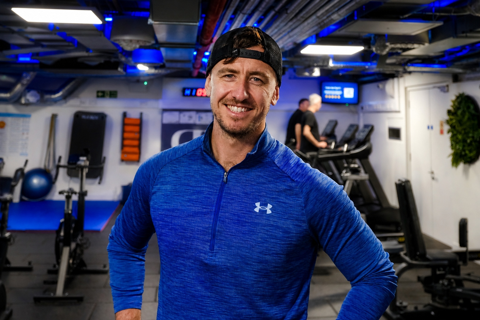 Timmo, personal trainer, posing in a Hove fitness centre